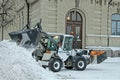 Snow Removal Tractor in City